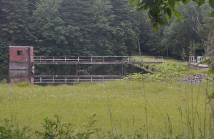 reservoir with bridge reflection